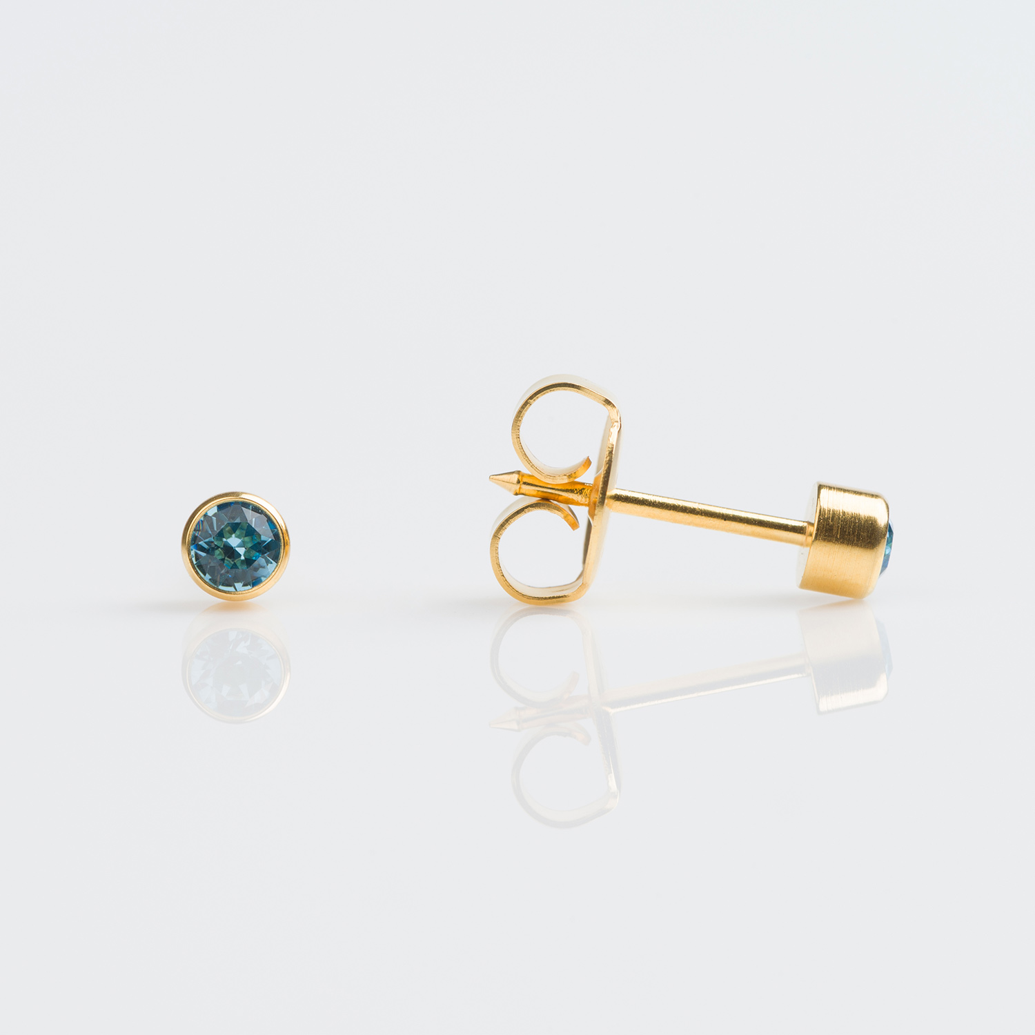 System 75™ Bezel-Set Birthstone Piercing Studs – 3mm – March Aquamarine Crystal – 9K Yellow Gold
