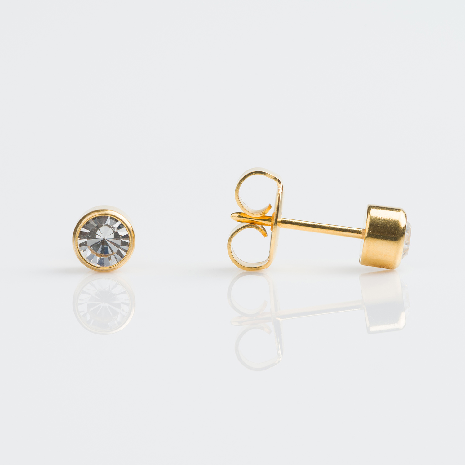 System 75™ Bezel-Set Birthstone Piercing Studs – 4mm – April Clear Crystal – 9K Yellow Gold