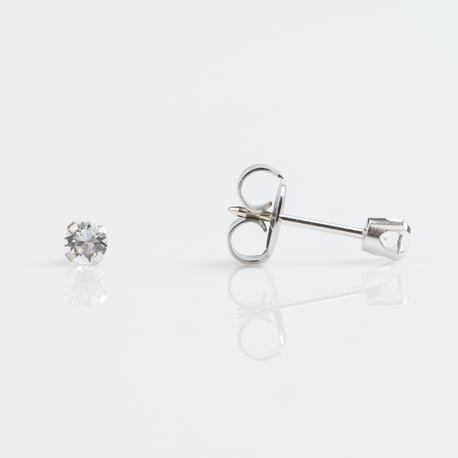System 75™ Prong-Set Birthstone Piercing Studs – 3mm – April Clear Crystal – 9K White Gold