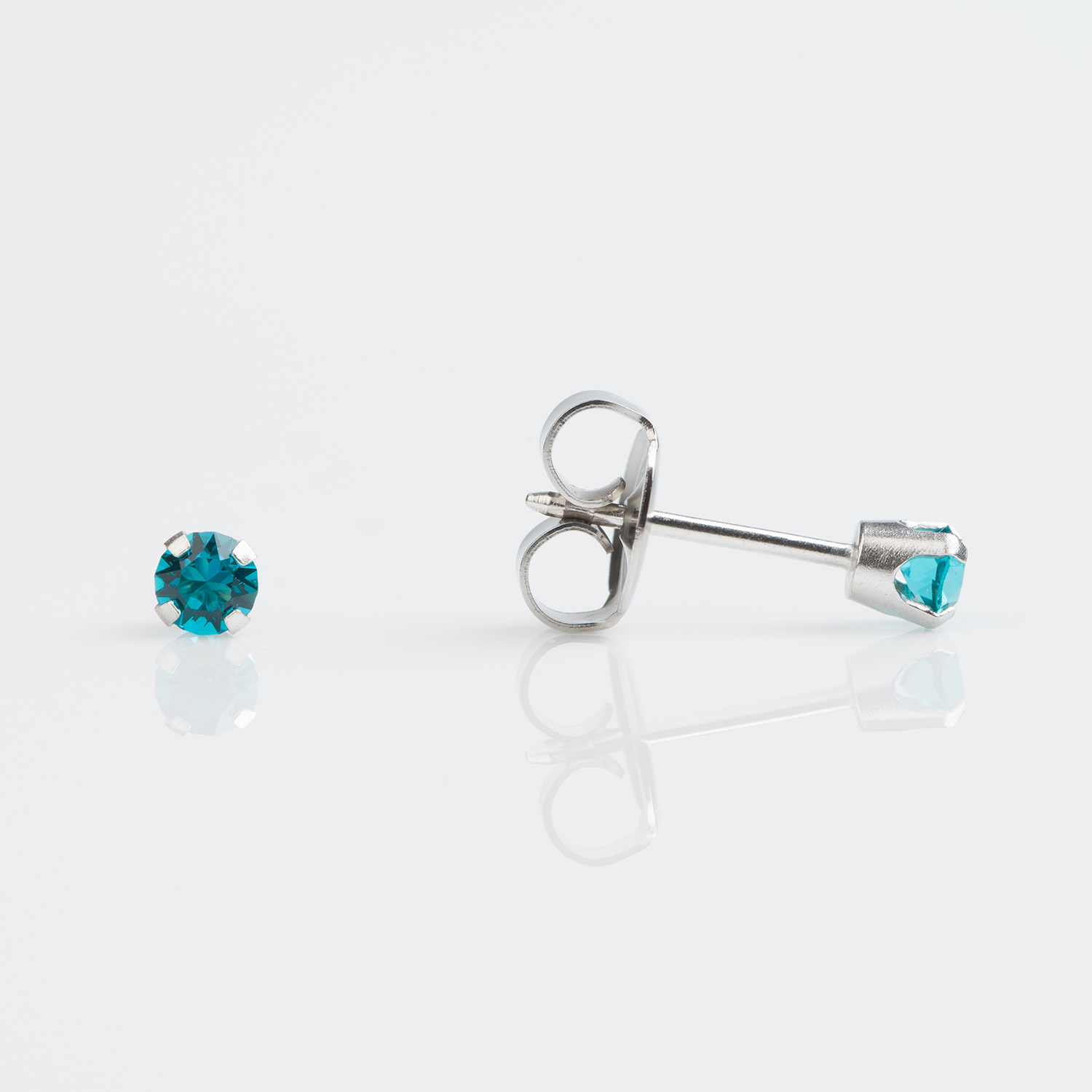 System 75™ Prong-Set Birthstone Piercing Studs – 3mm – December Blue Zircon Crystal –  9K White Gold