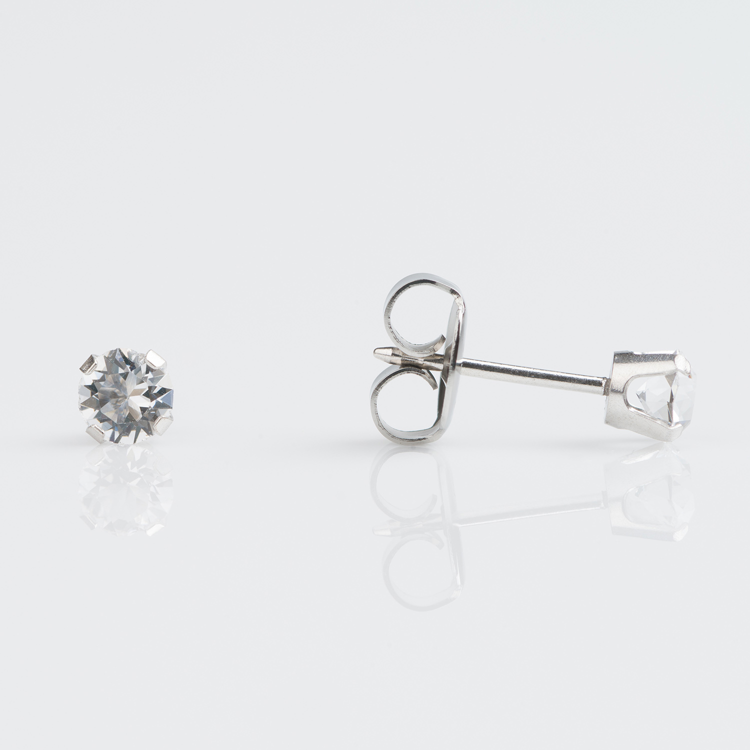 System 75™ Prong-Set Birthstone Piercing Studs – 4mm – April Clear Crystal – 9K White Gold