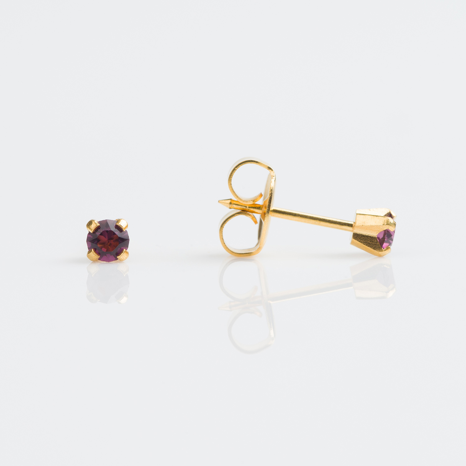 System 75™ Prong-Set Birthstone Piercing Studs – 3mm – April Clear Crystal – 18K Yellow Gold