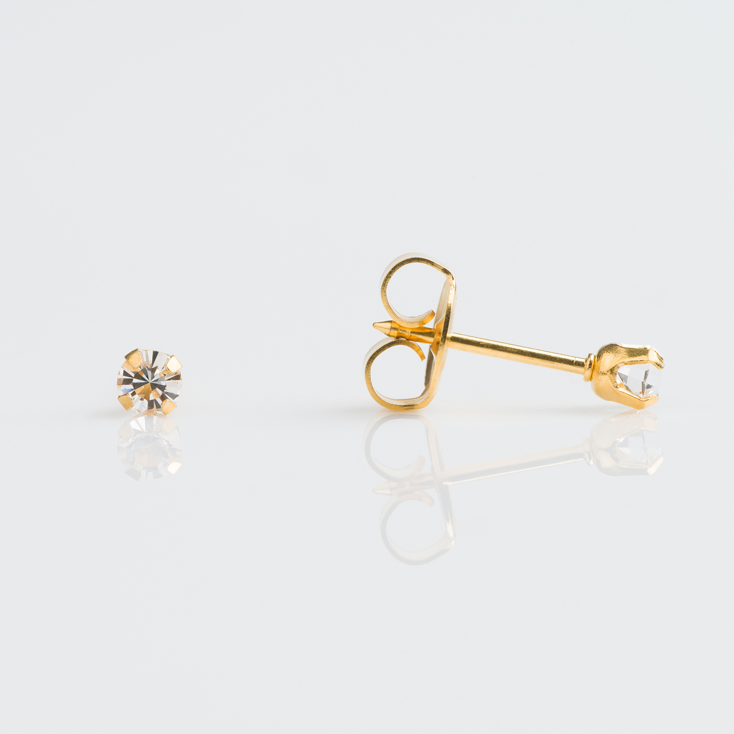 System 75™ Prong-Set Birthstone Piercing Studs – 3mm – April Clear Crystal – Gold-Plated