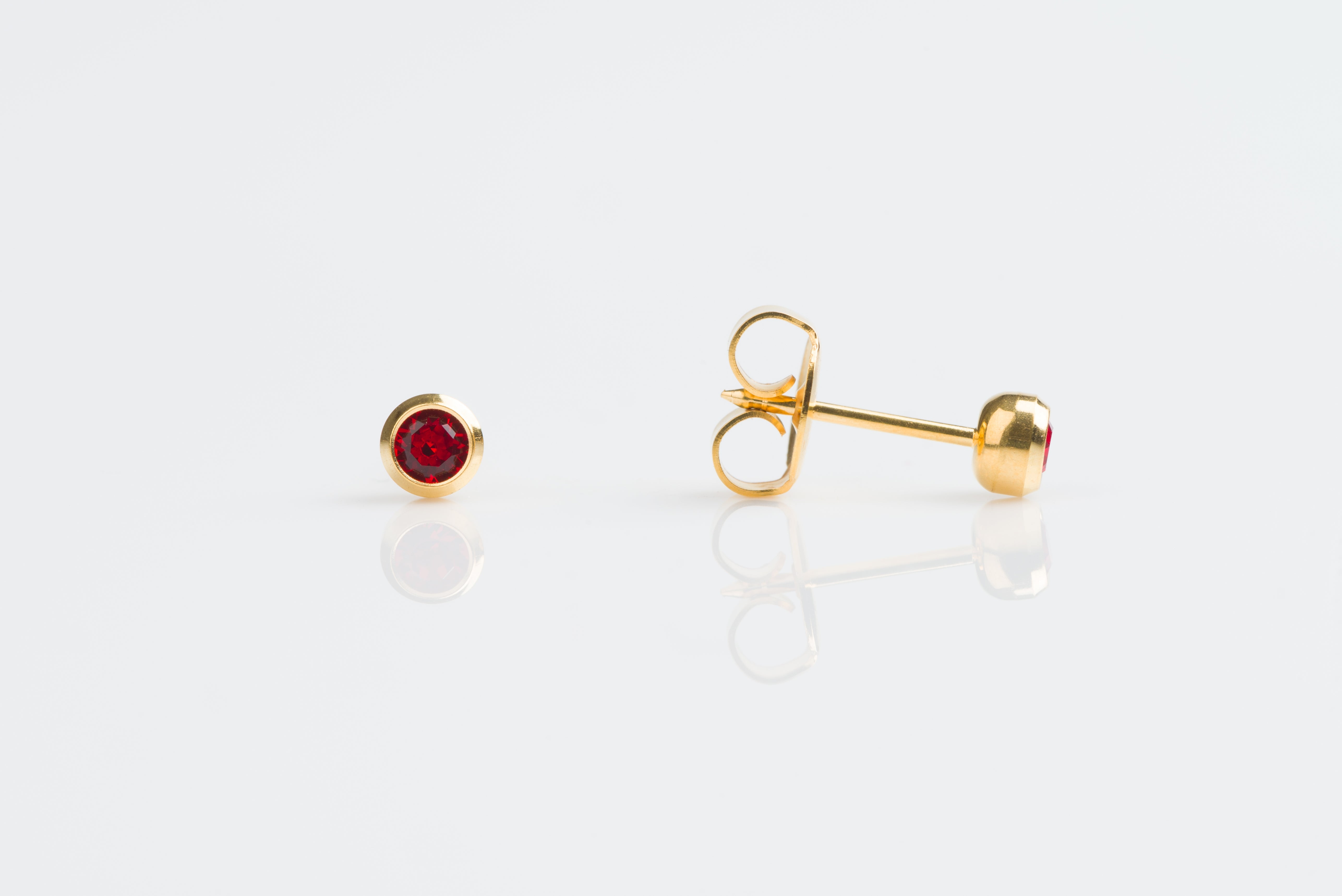 System 75™ Bezel-Set Birthstone Piercing Studs – 3mm – July Ruby Crystal – Gold-Plated