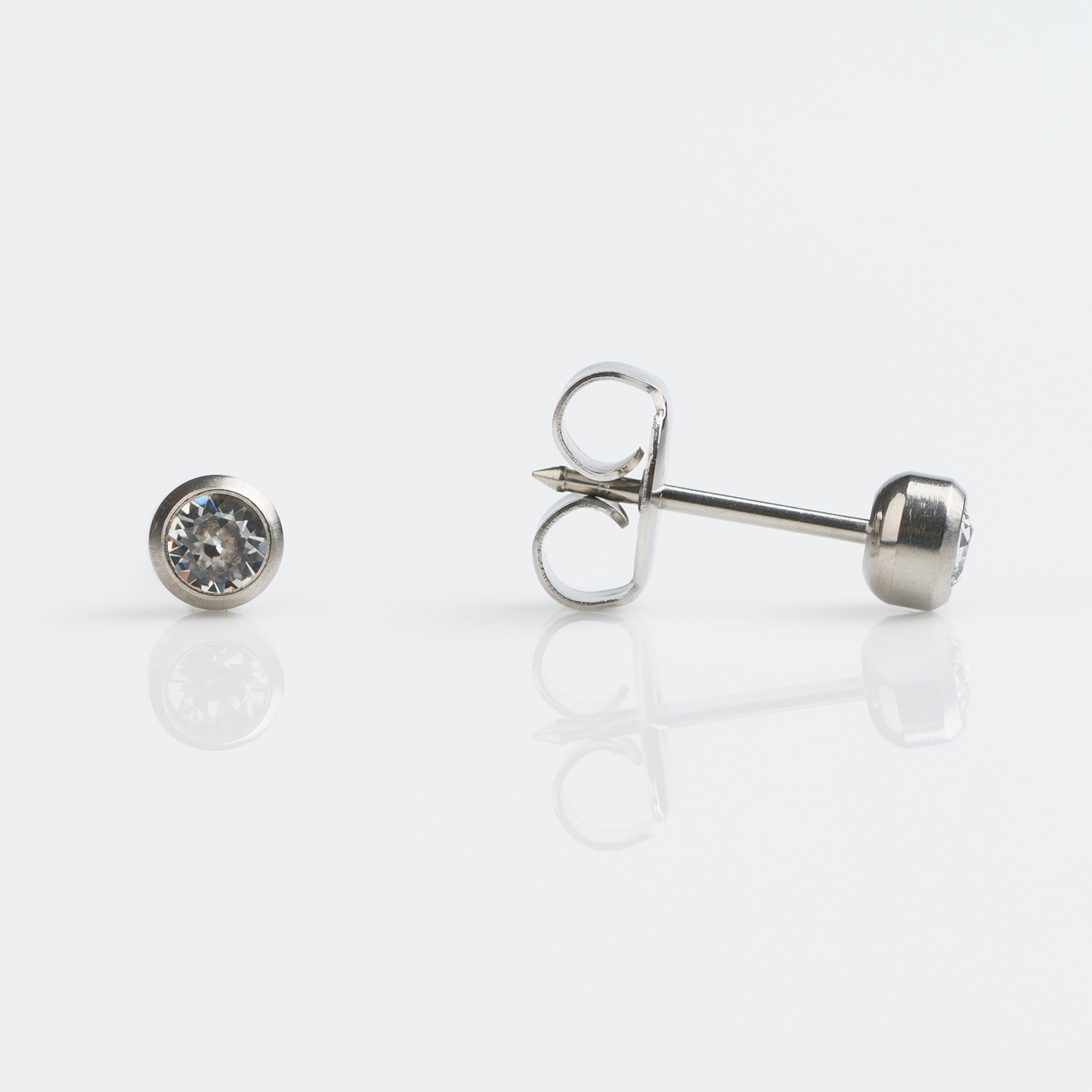 System 75™ Bezel-Set Birthstone Piercing Studs – 3mm – April Clear Crystal – Titanium