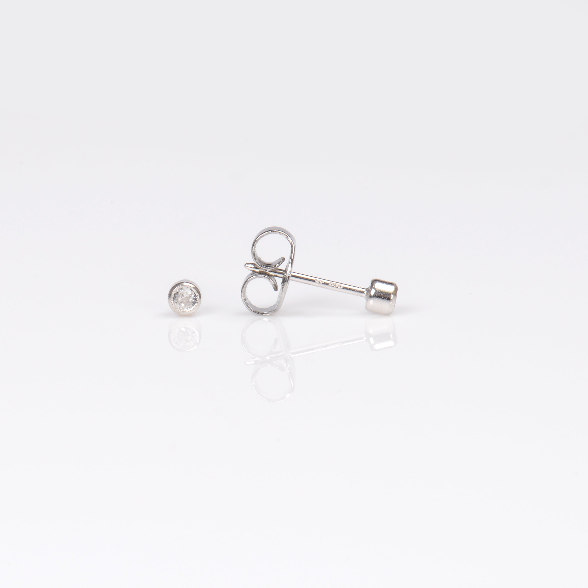 System 75™ Bezel-Set Birthstone Piercing Studs – 2mm – April Clear Crystal – 14K White Gold