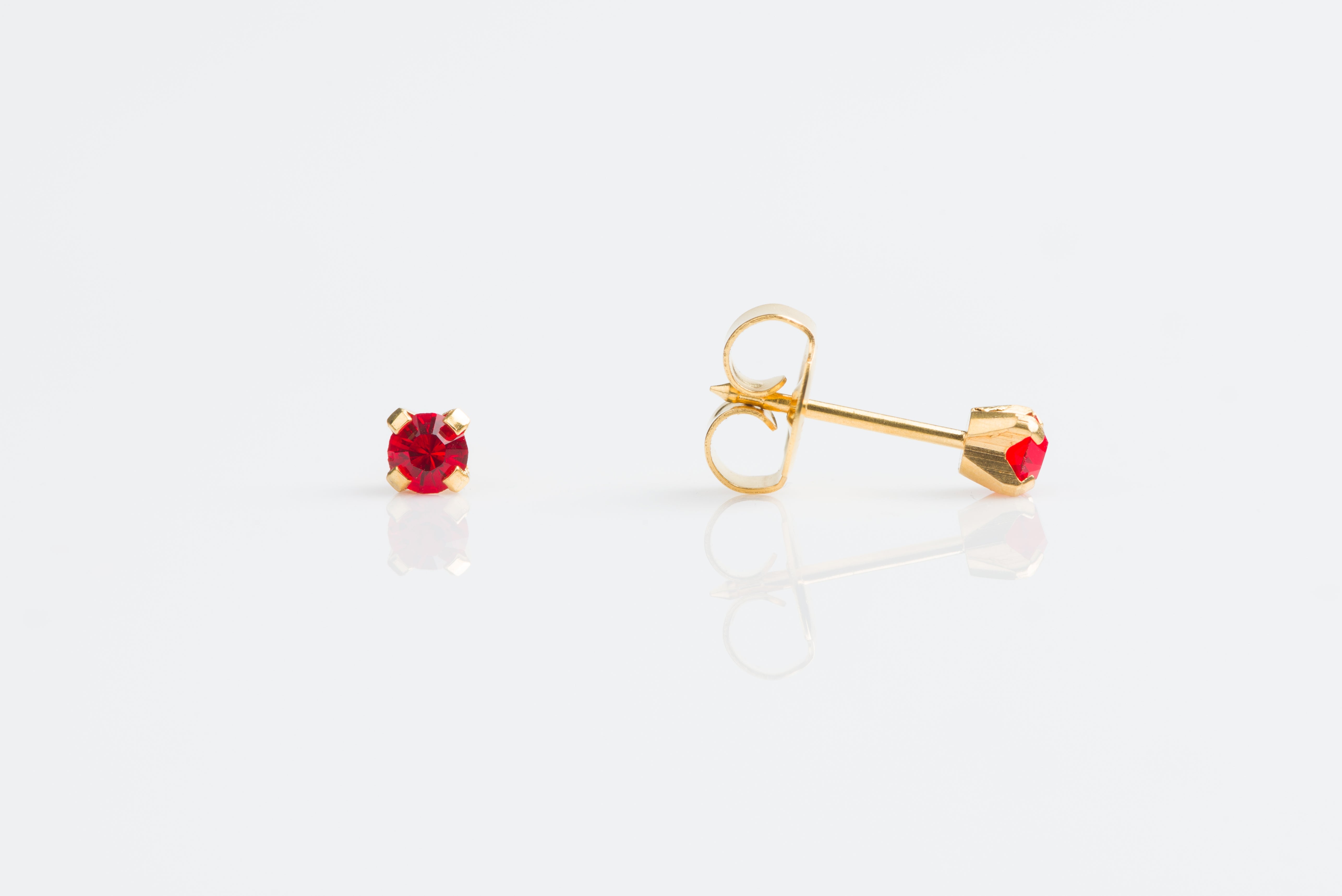 System 75™ Prong-Set Birthstone Piercing Studs – 3mm – July Ruby Crystal – 14K Yellow Gold