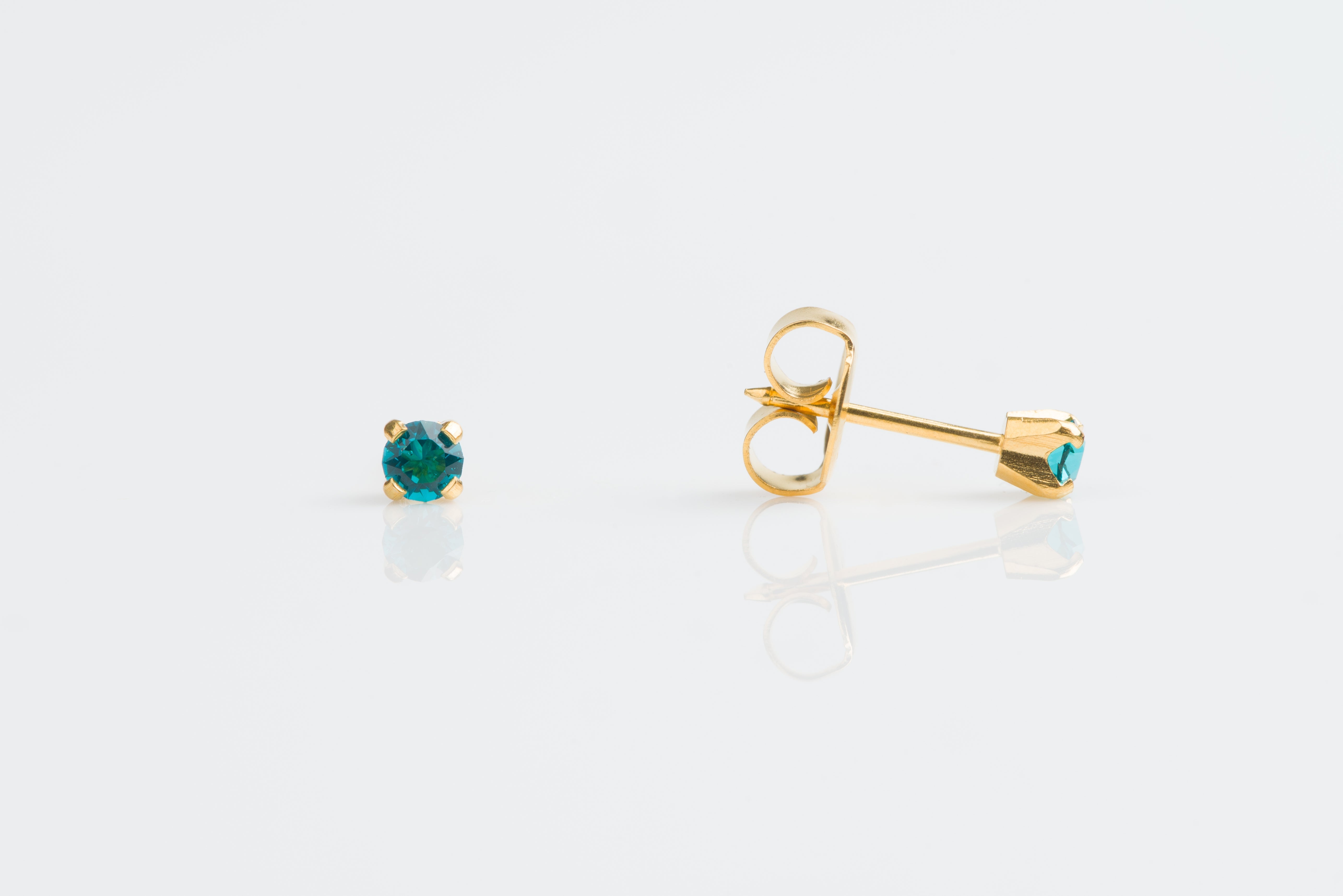 System 75™ Prong-Set Birthstone Piercing Studs – 3mm – December Blue Zircon – 14K Yellow Gold