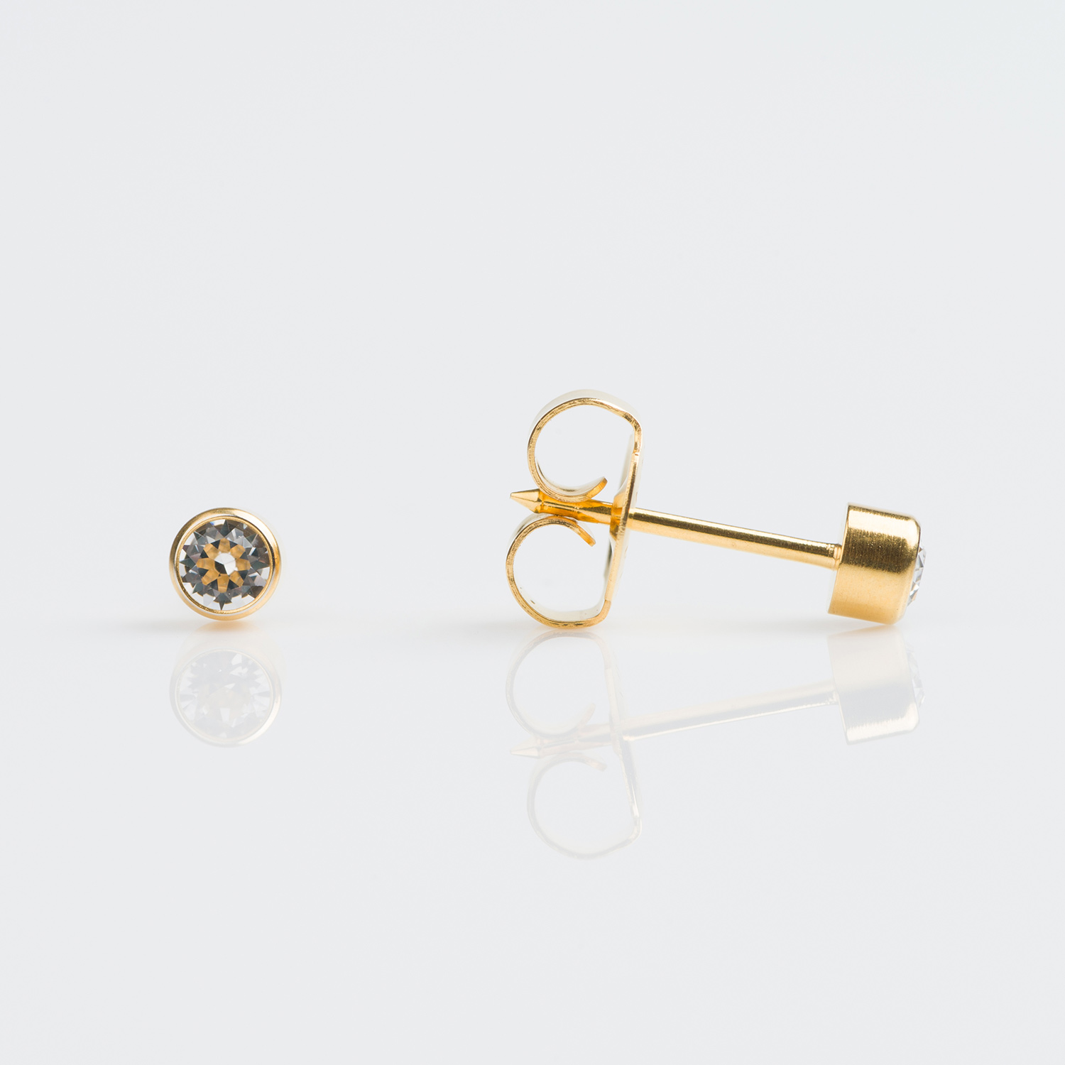 System 75™ Bezel-Set Birthstone Piercing Studs – 3mm – April Clear Crystal – 14K Yellow Gold