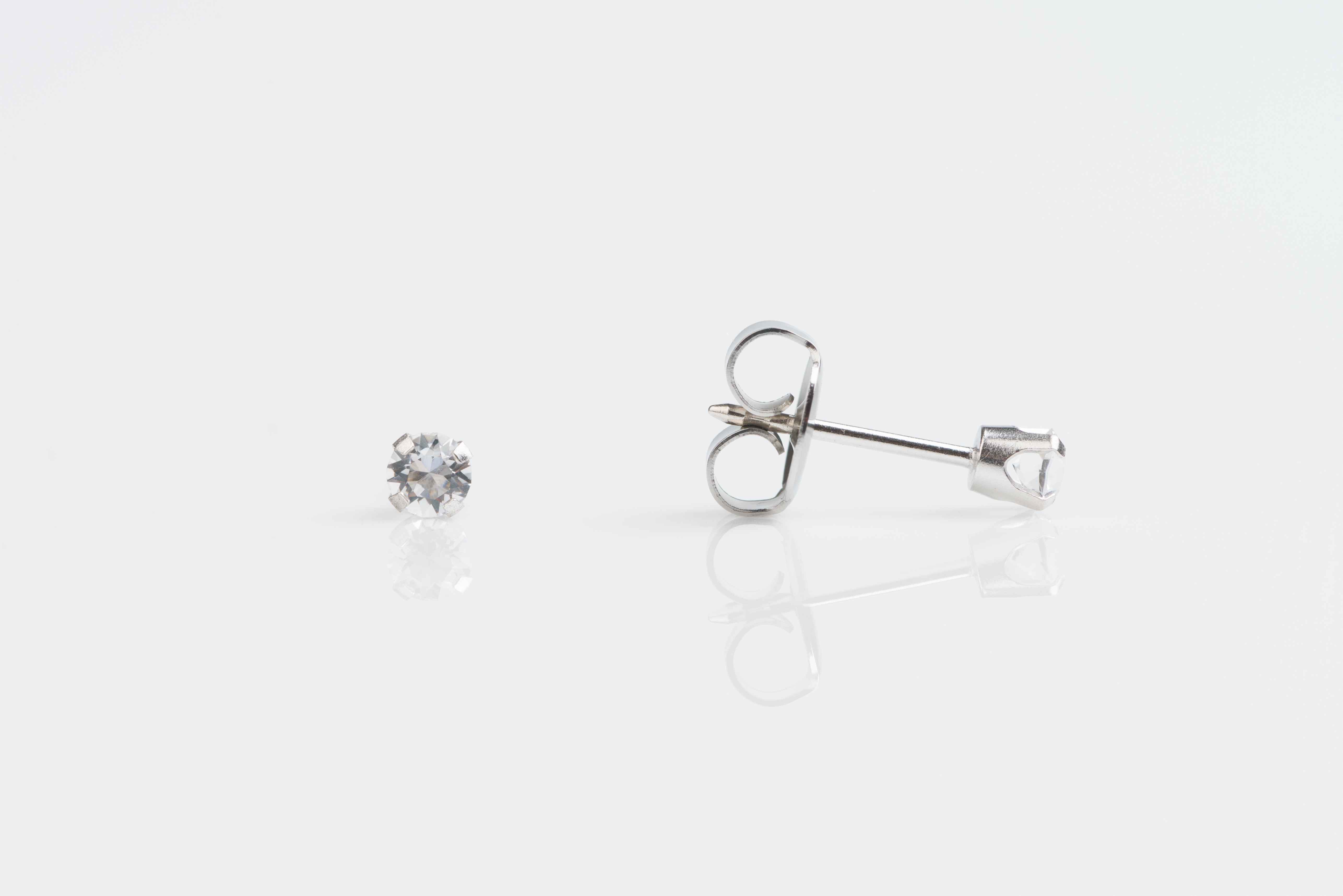 System 75™ Prong-Set Birthstone Piercing Studs – 3mm – April Clear Crystal – 14K White Gold