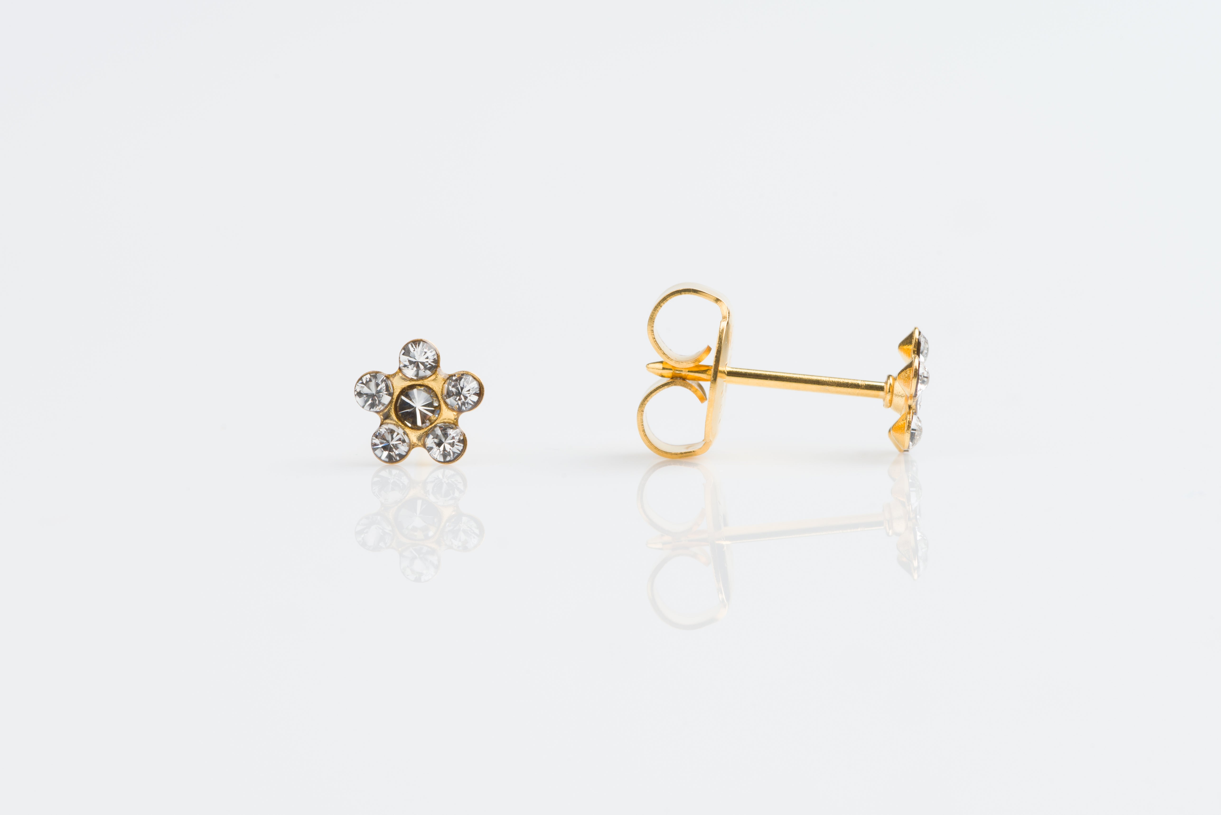 System 75™ Daisy Birthstone Piercing Studs – Clear Crystal – Regular Post – 14K Yellow Gold