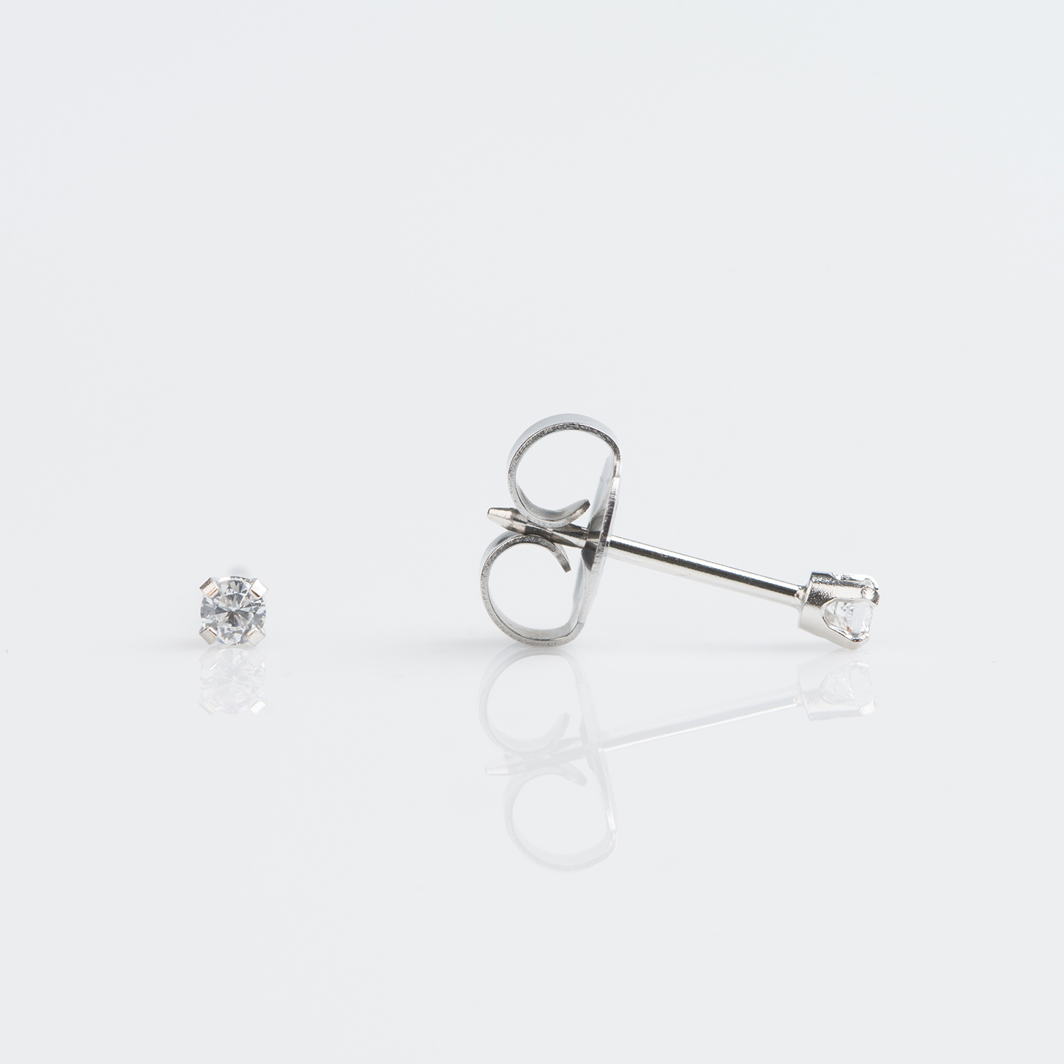System 75™ Prong-Set Birthstone Piercing Studs – 2mm – April Clear Crystal – 18K White Gold