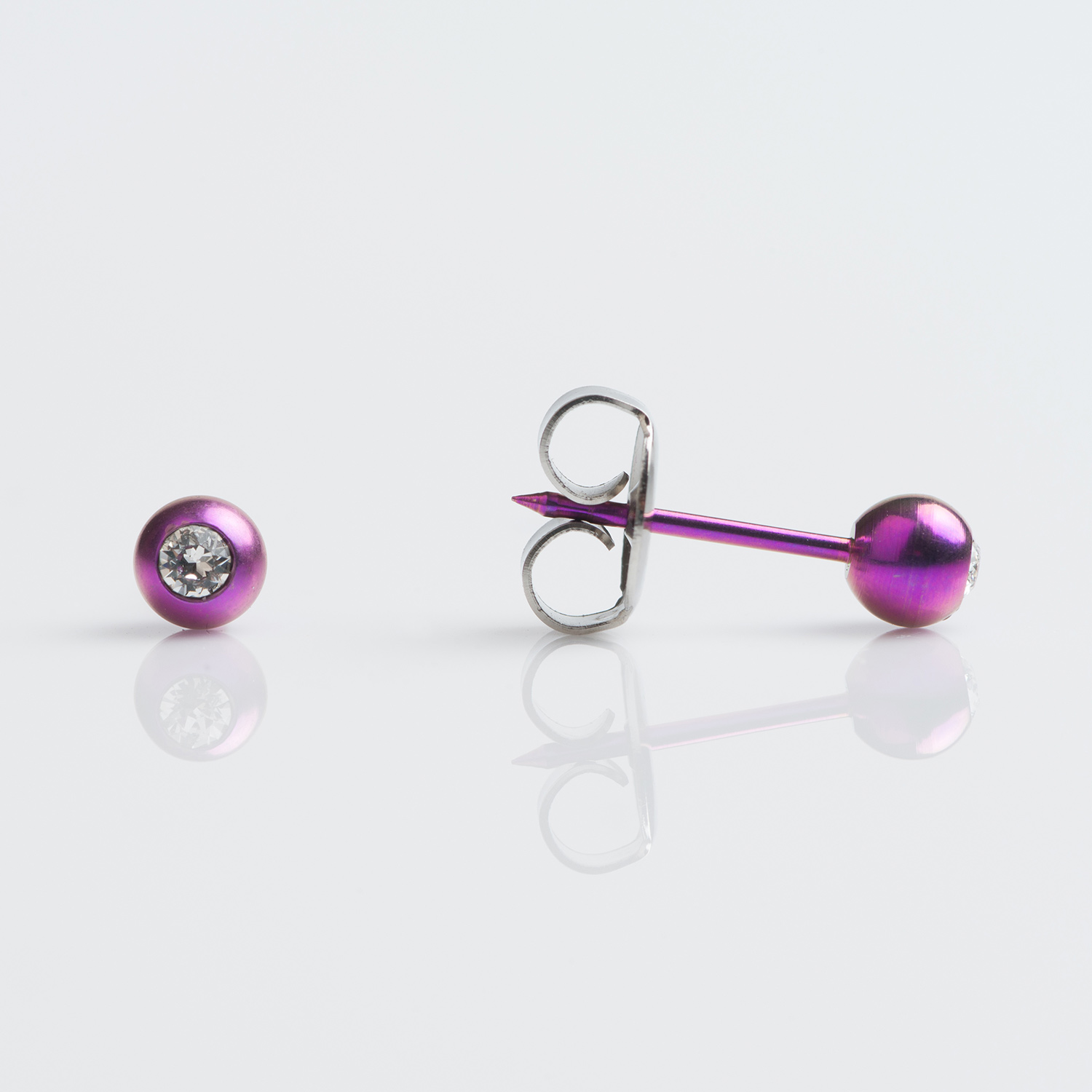 System 75™ Birthstone Ball Piercing Studs – 4mm – Clear Crystal – Purple Titanium