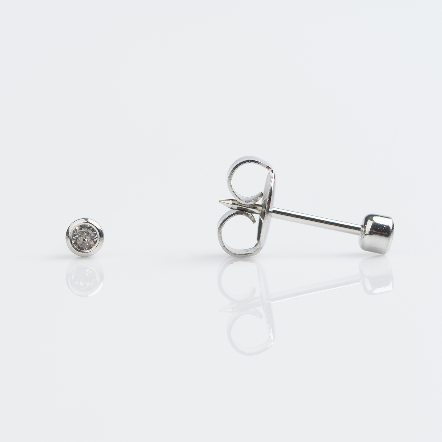 System 75™ Bezel-Set Birthstone Piercing Studs – 2mm – April Clear Crystal – Stainless Steel