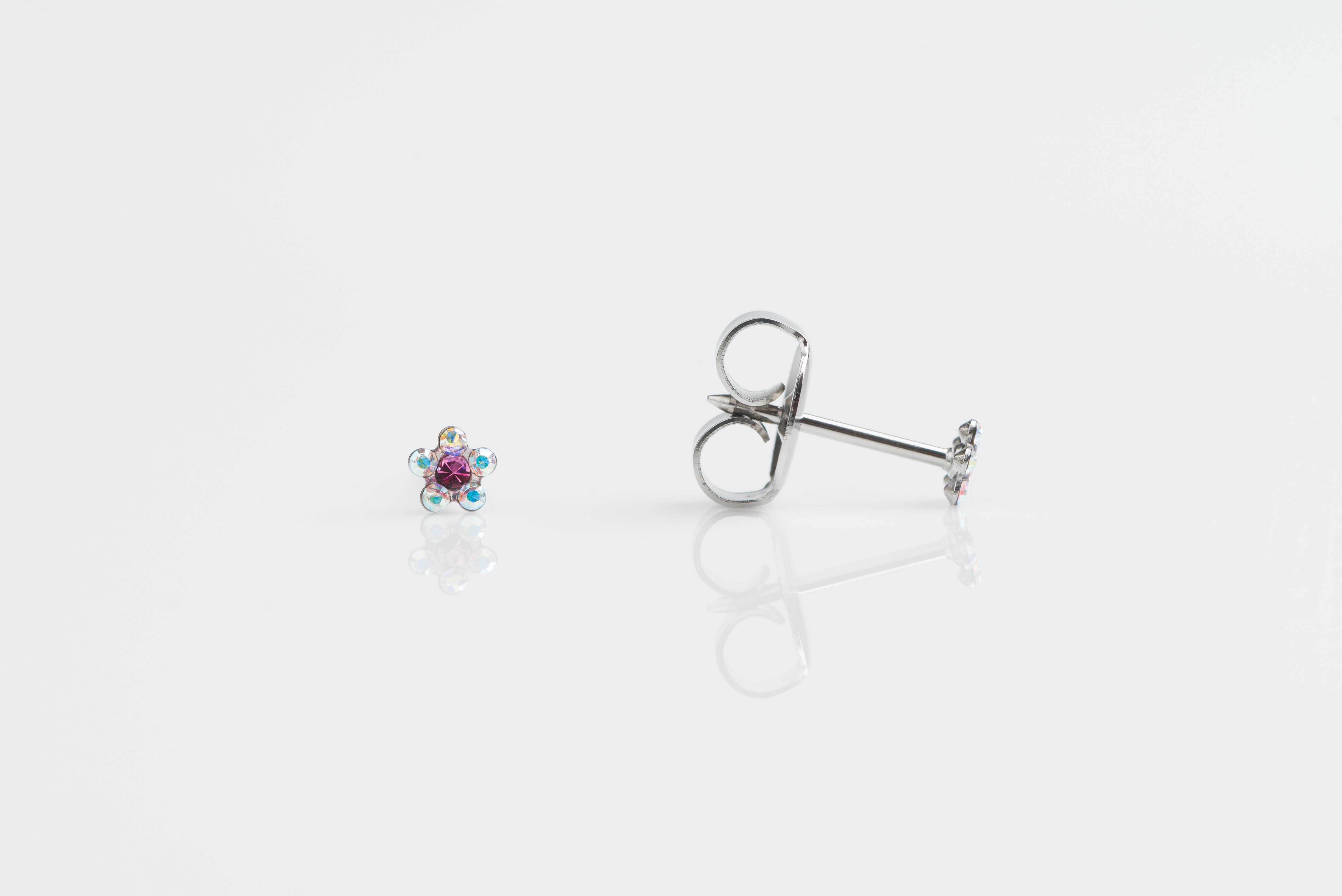 System 75™ Daisy Birthstone Piercing Studs – Aurora Borealis Crystal + October Rose – Baby Post – Stainless Steel