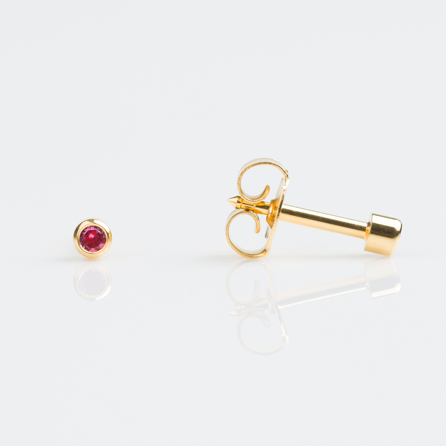 Universal™ Select Gold-Plated Bezel-Set October Rose Piercing Studs Universal™ Select Gold-Plated Bezel-Set October Rose Piercing Studs