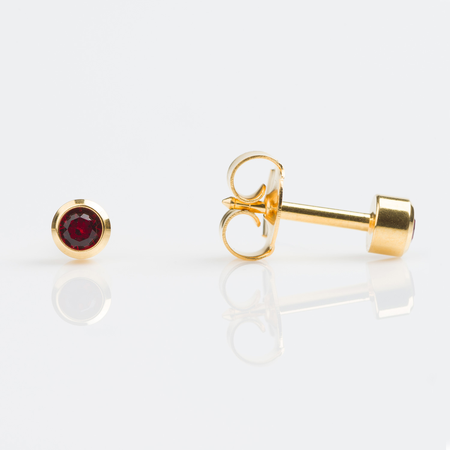 Universal™ Select Gold-Plated Bezel-Set January Garnet Piercing Studs