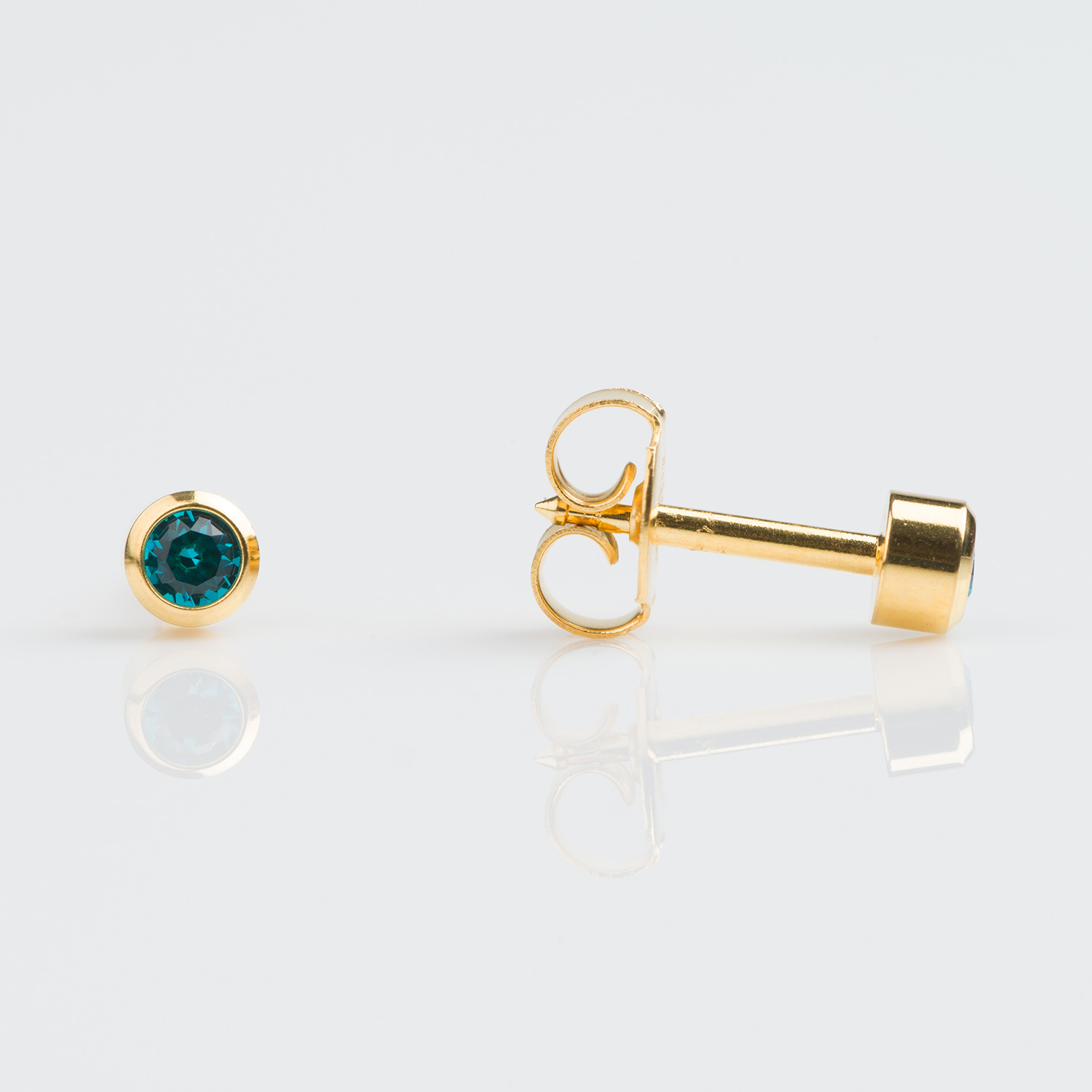 Universal™ Select Gold-Plated Bezel-Set December Blue Zircon Piercing Studs Universal™ Select Gold-Plated Bezel-Set December Blue Zircon Piercing Studs